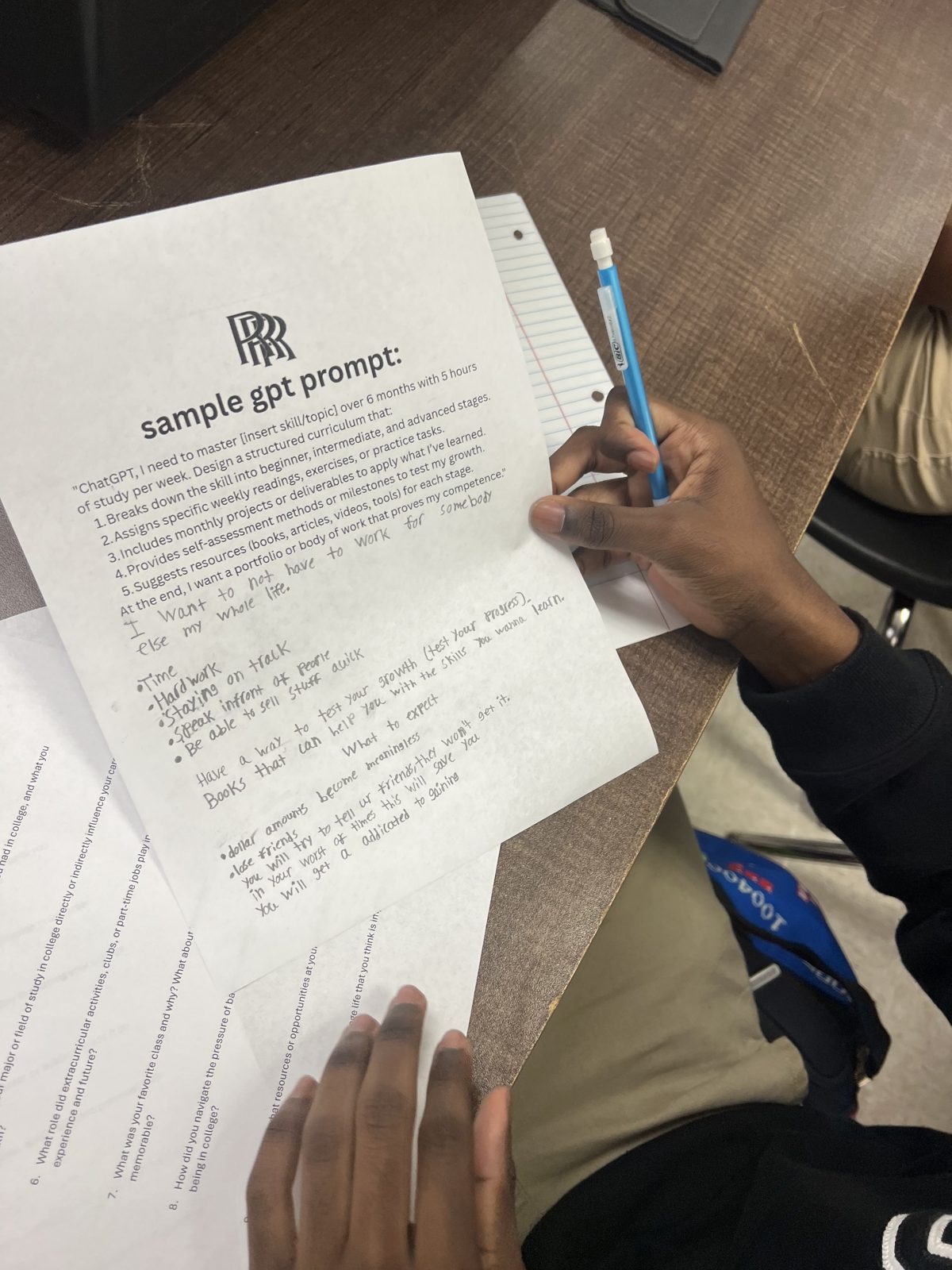 Student working through the RRR sample GPT prompt worksheet